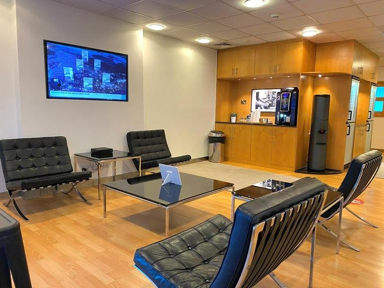 Warm modern reception and waiting area at The H Dubai, Office Tower, One Sheikh Zayed Road.