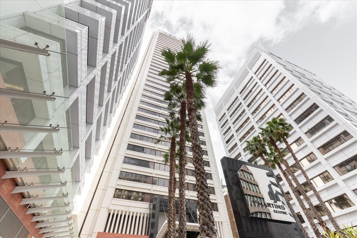 Low-angle exterior view of the modern white skyscrapers at 44 St Georges Terrace, Perth.