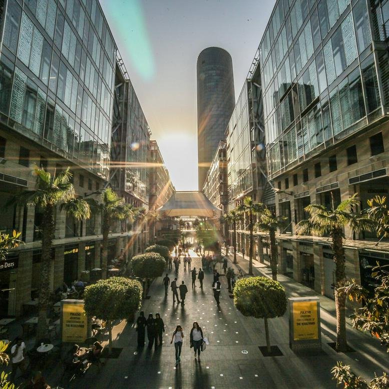 Exterior view of the modern glass-facade towers at Rafiq Al Hariri Avenue 1, The Boulevard.
