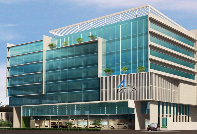 Exterior view of the modern glass-facade building at Redbrick Offices, Aveda Meta.