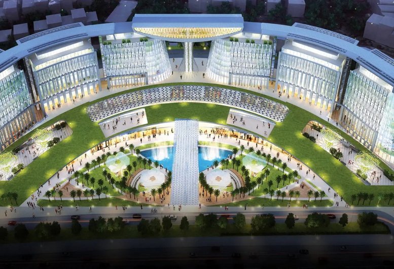 Aerial rendering of the circular glass exterior of Redbrick Offices, NBCC’s World Trade Centre, New Delhi.