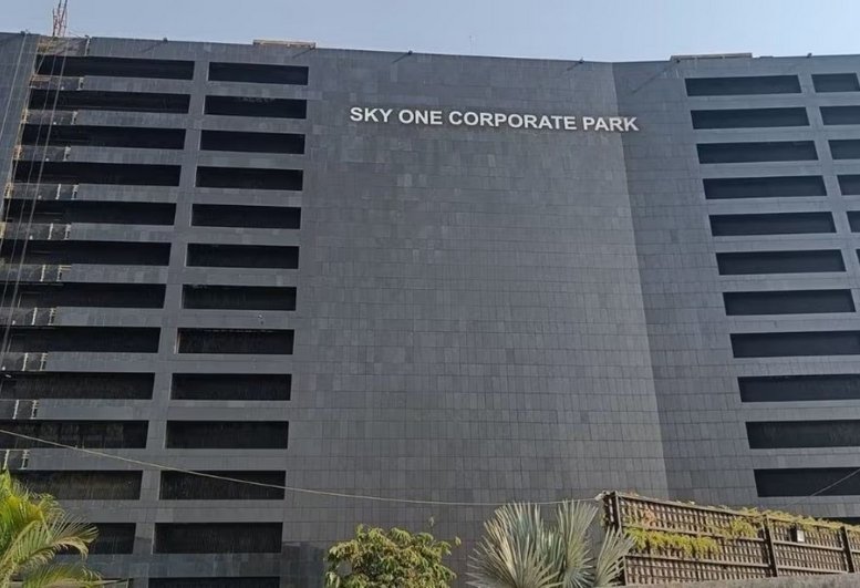 Exterior view of the modern grey facade at Redbrick Offices, Sky One Corporate Park.