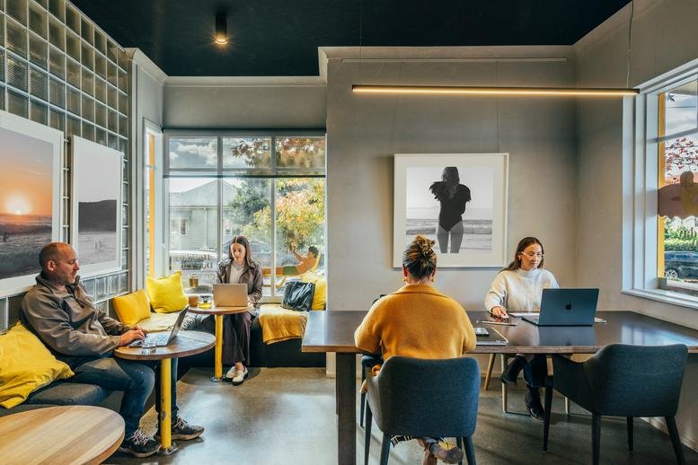 Spacious coworking space at 1/70 Albert Street, Berry with lounge seating, large tables, and natural light.