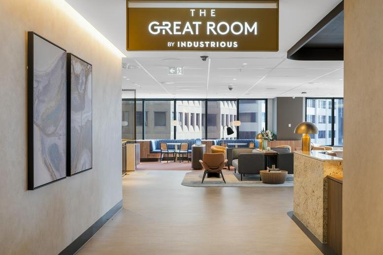 Entrance to The Great Room at Level 15 & 14, 1 O’Connell Street with modern art and a bright lounge area.