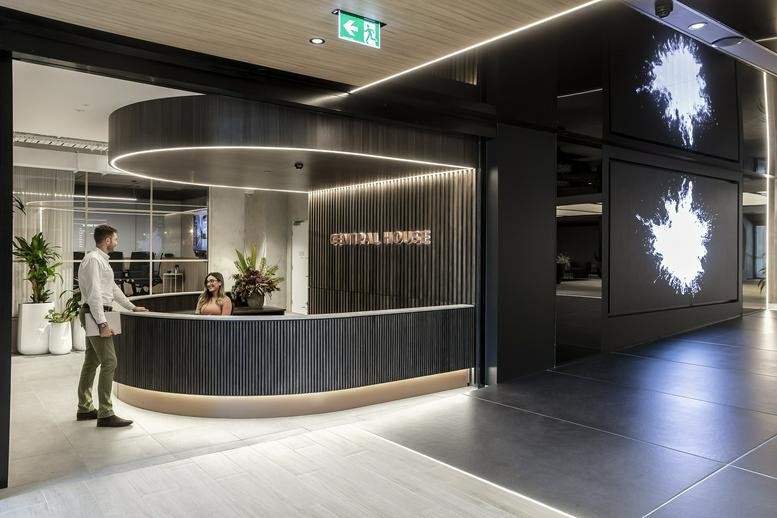 Sleek, modern reception desk and lobby at 101 Moray Street, South Melbourne.