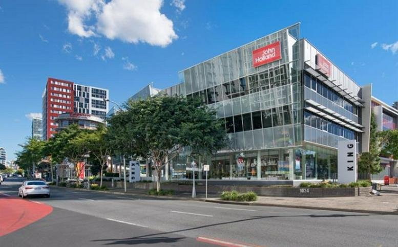 Exterior view of the glass and steel office building at 1024 Ann Street in Fortitude Valley.