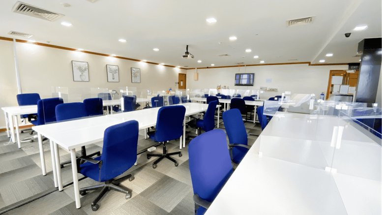 Bright open-plan workspace at 111 North Bridge Road, No. 21-01 Peninsula Plaza, Singapore with blue chairs.