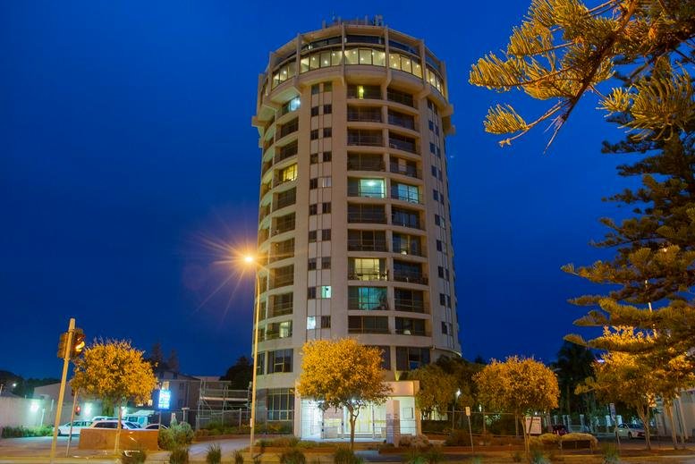 Exterior view of the cylindrical high-rise building at 12/760 Anzac Highway.