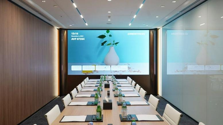 Grand boardroom at The Gateway East, Level 36, 152 Beach Road, Singapore with a large digital display and long table.