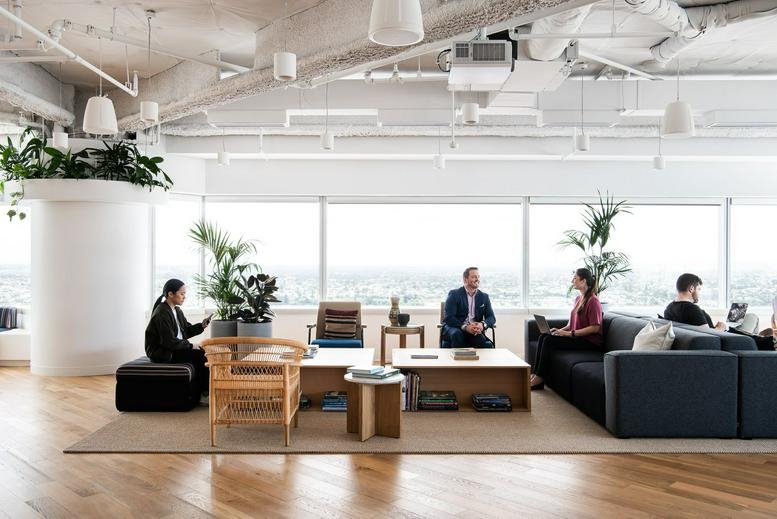 Spacious open-plan reception and lounge area at 152 St Georges Terrace, Perth with city views.