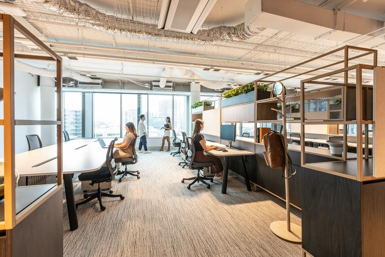 Spacious open-plan workspace at 154 Melbourne Street, South Brisbane with ergonomic seating and natural light.