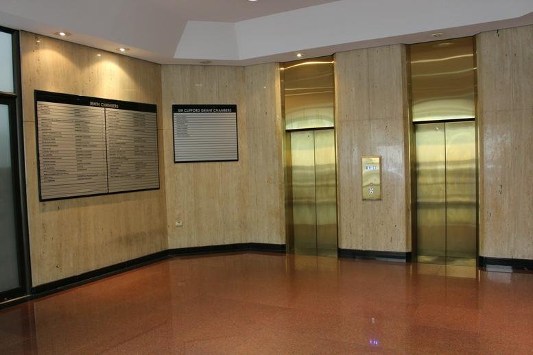 Polished building lobby at Level 3, 16 Irwin Street, Perth, Western Australia with marble-style walls.