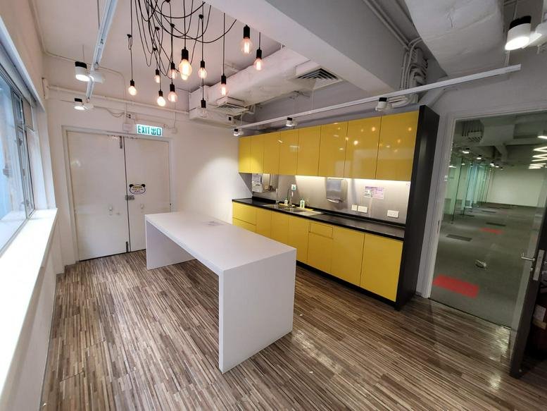 Brightly lit kitchen and lounge area at Hong Kong Spinners Industrial Building Phase 5.