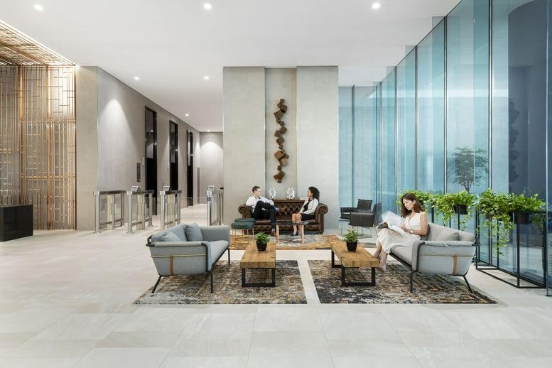 Spacious modern lobby at 2, Tanjong Katong Road with stylish lounge seating and decorative wall art.