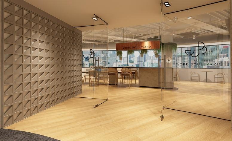 Modern glass entrance of 20 Collyer Quay, Raffles Place, Singapore with textured feature wall.