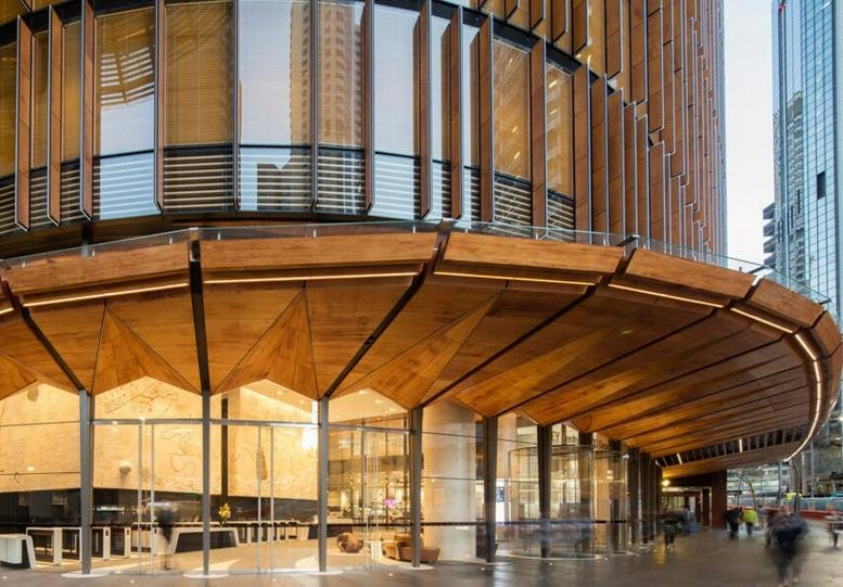 Exterior entrance of the 200 George Street building with a striking curved timber canopy.