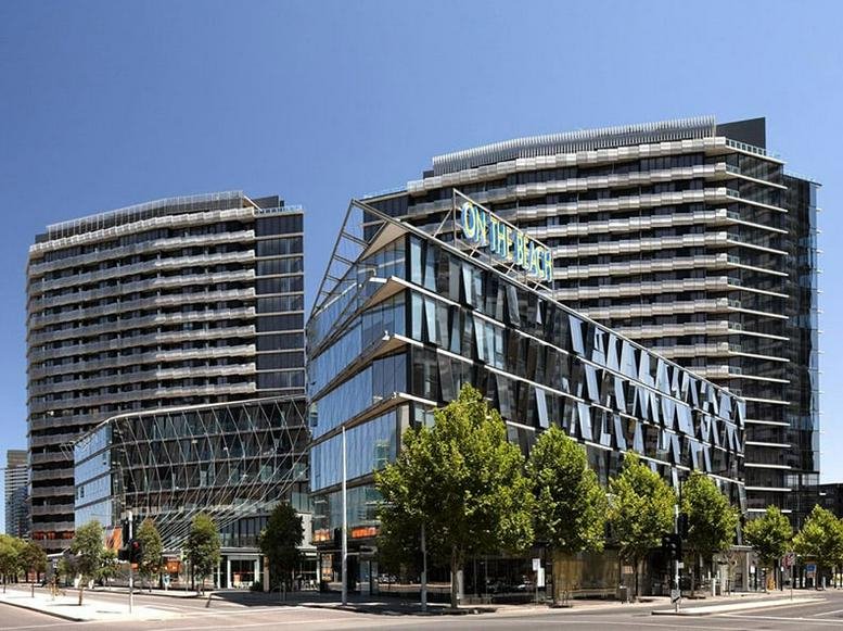 Exterior view of the glass-facade building at 207B 757 Bourke Street, Docklands, Melbourne, Victoria.