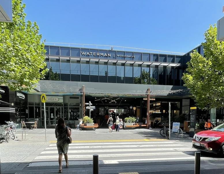 Exterior view of the glass-facade building at Level 1, 21-31 Hall Street Moonee Ponds Central.