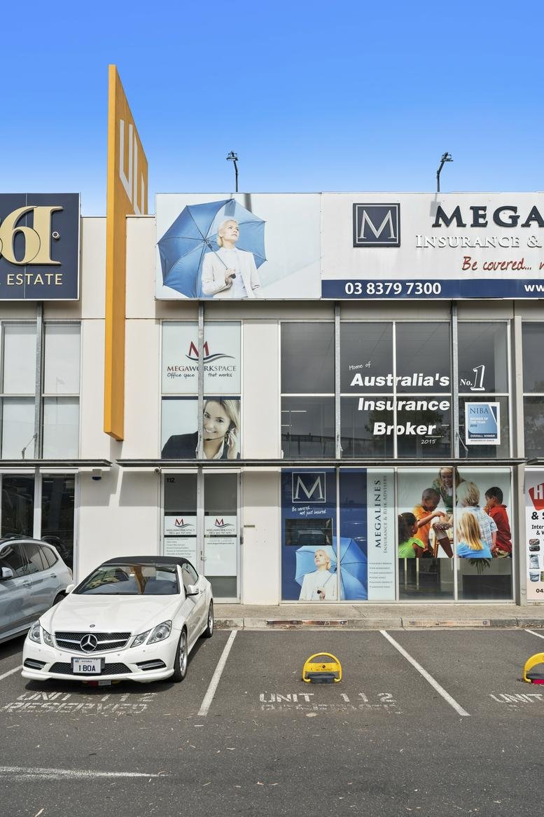 Exterior storefront of 22-30 Wallace Avenue Unit 112 with branded signage and parking.