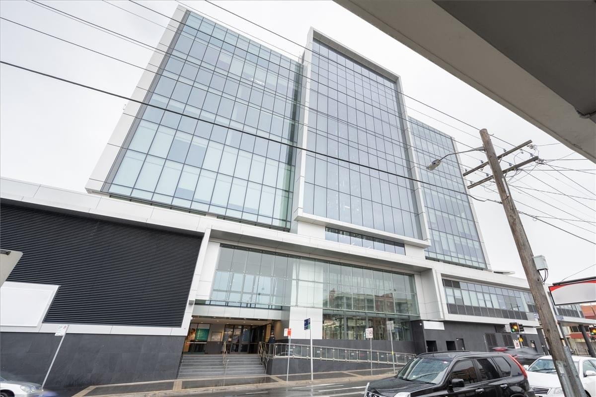 Exterior view of the glass-facade 25 Restwell Street building.