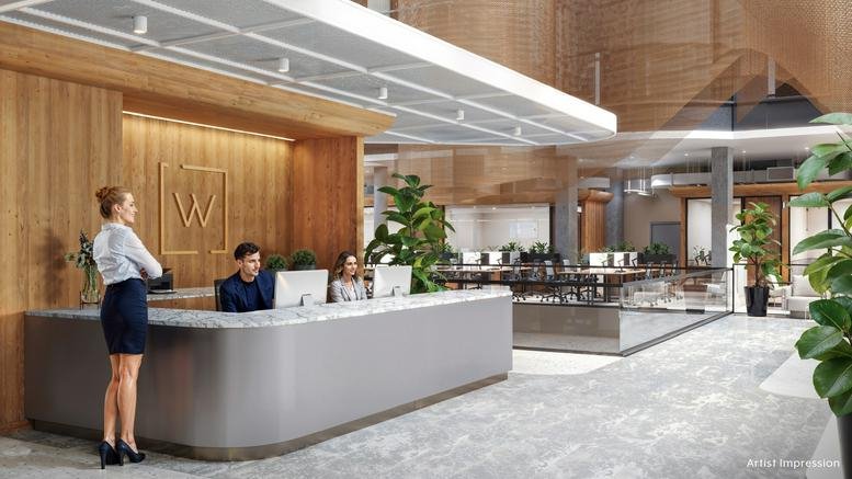Spacious reception lobby at 260 Collins Street, Melbourne featuring a sleek desk and wooden wall panels.