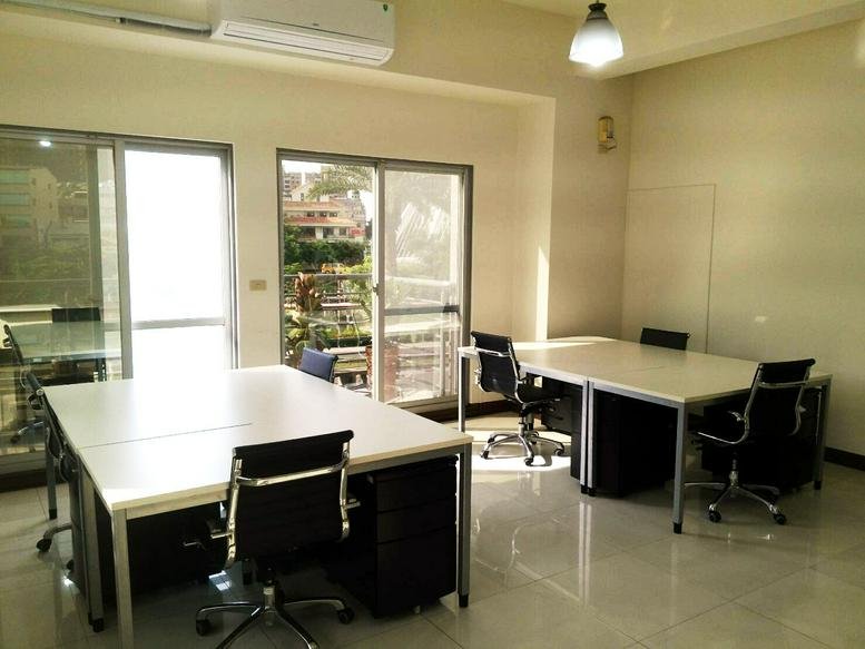 Spacious open-plan workspace at 710 Tongmeng 3rd Road, Sanmin District, Kaohsiung City with natural light.