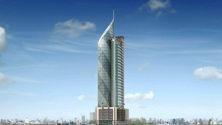 Exterior view of the iconic glass-facade tower at 3036, King Fahd Road, Al Bandariyah.