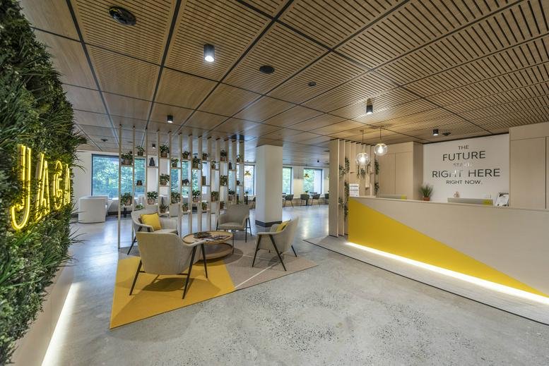 Reception and lobby at Level 1, 33 Allara Street with warm wood ceilings and greenery feature wall.