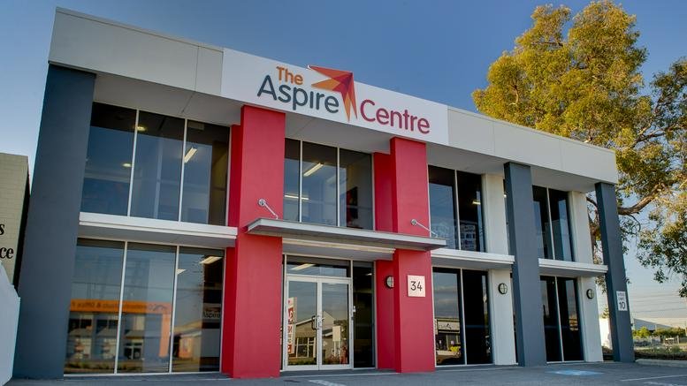 Exterior view of the modern two-story facade at The Aspire Centre.