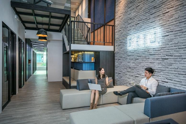 Spacious lounge at 37A, Jalan Harmonium 23/13, Taman Desa Tebrau, Johor Bahru with a stone feature wall and soft seating.