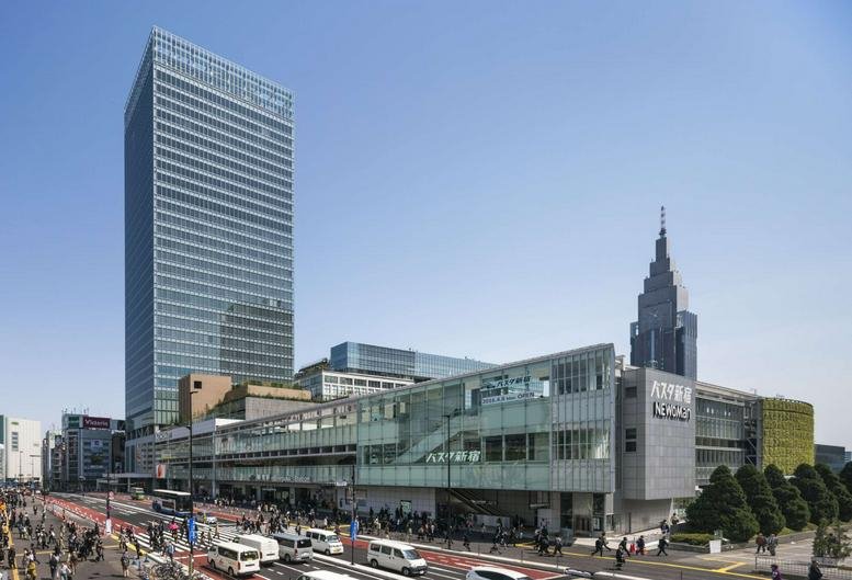 Exterior view of the glass-facade Shinjuku Miraina Tower in Tokyo.