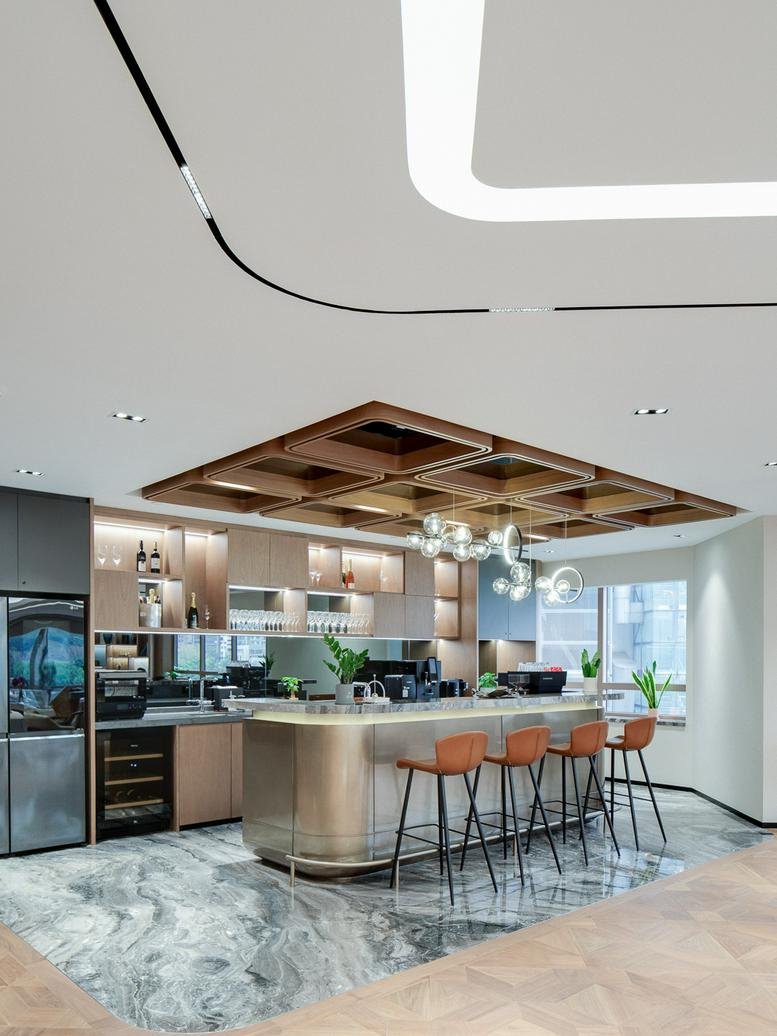 Contemporary office kitchen and bar area at Level 18-19, 4-4A, Des Voeux Road Central, Hong Kong.