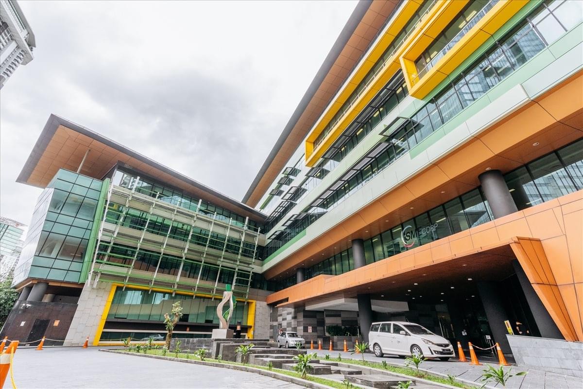 Exterior view of the colorful, modern glass building facade at Block D (L3-5), Platinum Sentral.