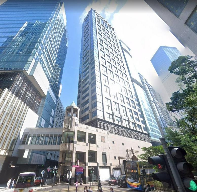 Exterior view of the contemporary high-rise building at 9 Queen’s Road Central.