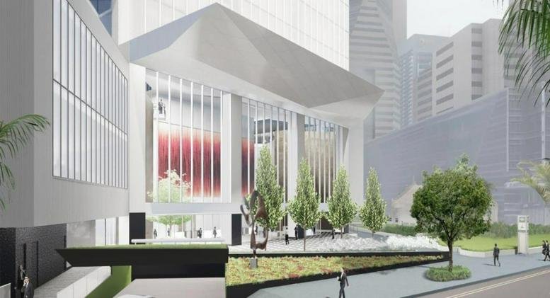 Exterior view of the modern glass entrance and plaza of Singapore Land Tower, 50 Raffles Place.