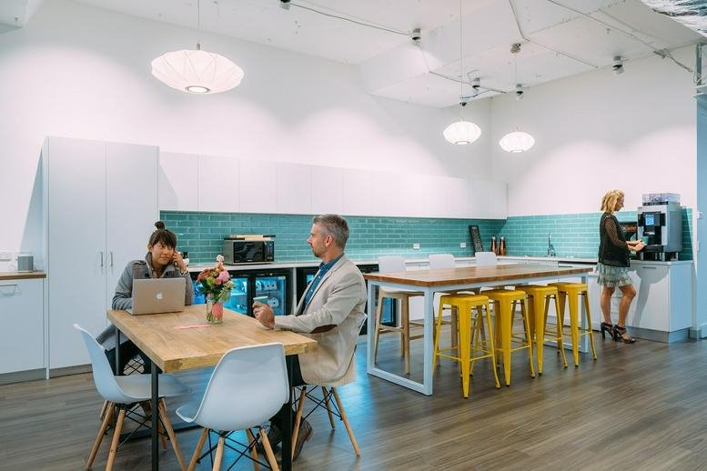 Spacious communal kitchen and breakout area at Levels 2 & 3, 52 Albert Road, Melbourne, Victoria.