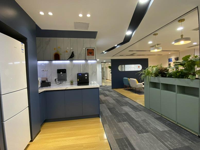Spacious lounge and kitchenette at 5F, Thumb Plaza, 880 Tongan Road, Laoshan District, Qingdao.