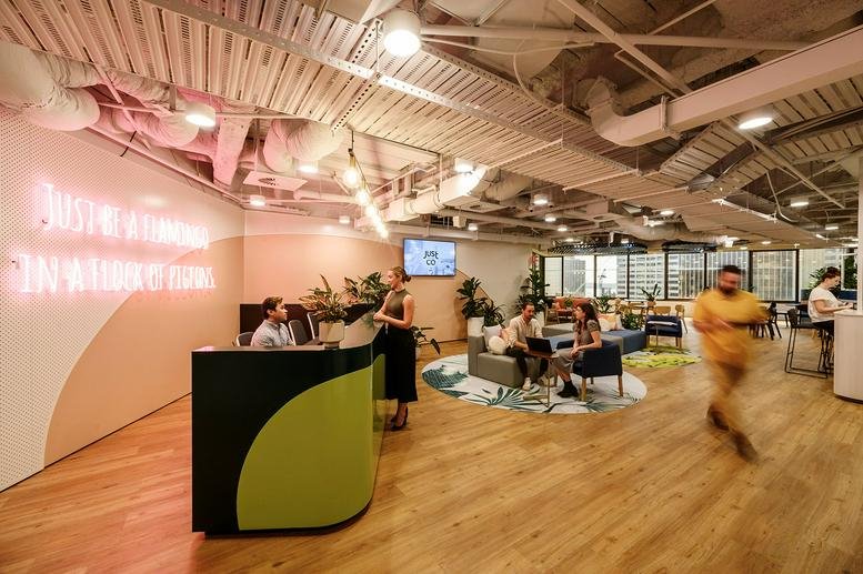 Spacious lobby at Office Space to Rent on Margaret Street - Sydney CBD featuring a modern curved reception desk.