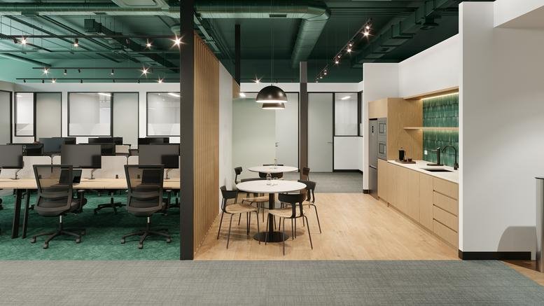 Spacious communal area at 64-104, Springfield Road, Melbourne with a kitchen, dining tables, and green ceiling.