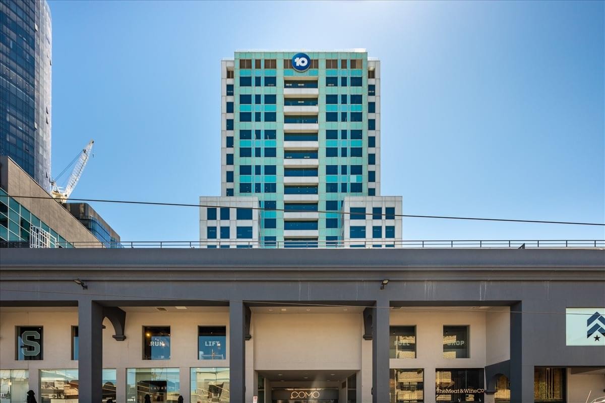 Exterior view of the multi-story glass building at 644 Chapel Street.