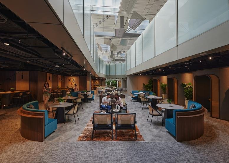 Spacious communal lounge and coworking area at 65 Airport Boulevard Terminal 3, No. 03-34.