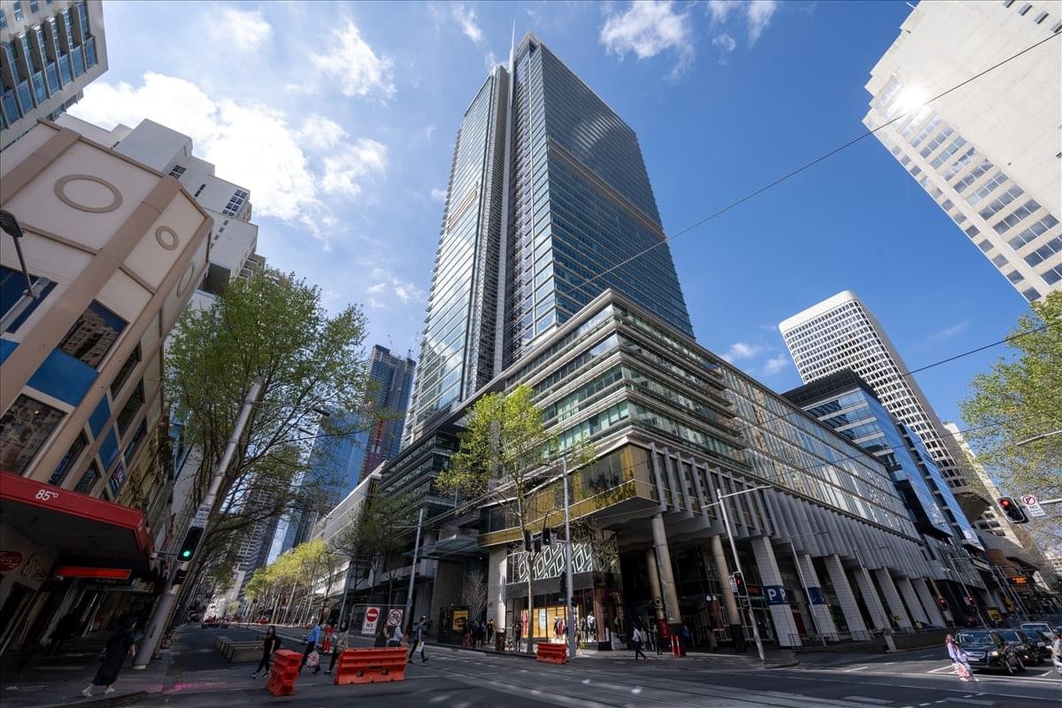 Exterior view of the soaring glass skyscraper at 680 George St.