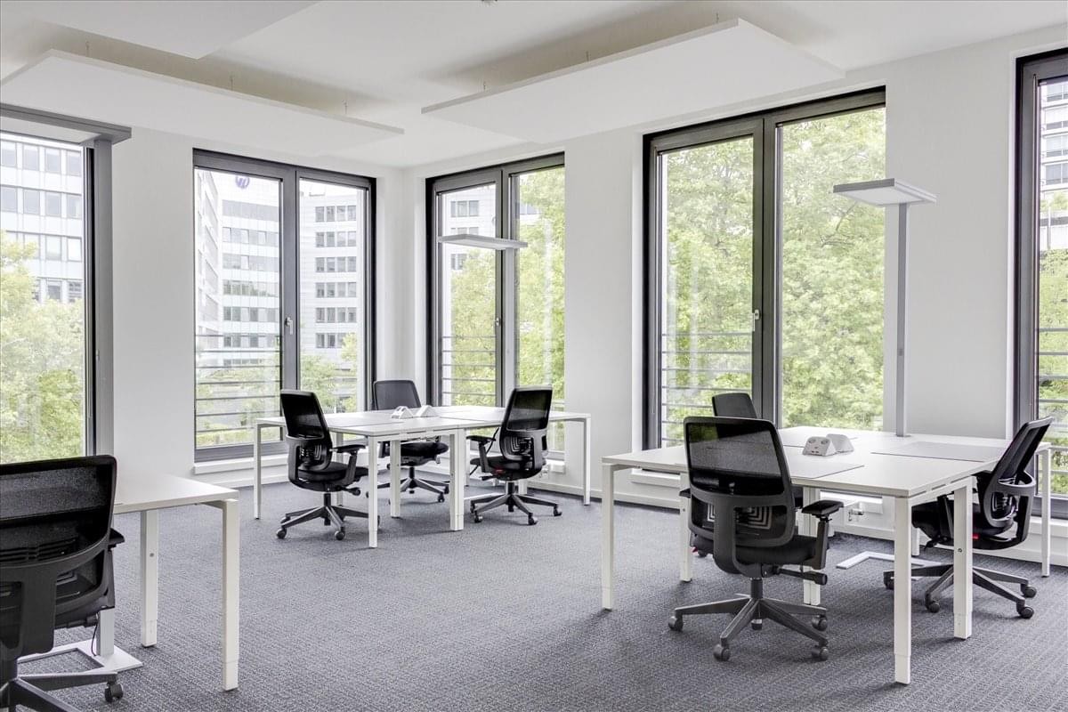 Spacious open-plan workspace at 7/F Xingkang 1st Street, Shuangliu District, Chengdu with natural light.