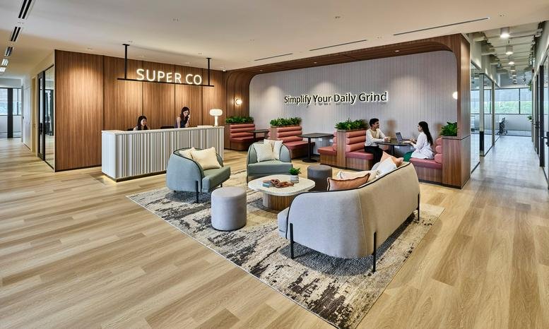 Spacious reception and lounge at 7 Holland Village Way, Tower Lobby B, with modern furniture and wooden floors.