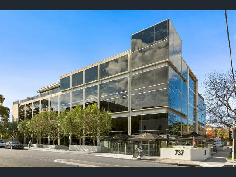 Modern glass-fronted exterior of the office building at 737, Burwood Road, Hawthorn East.