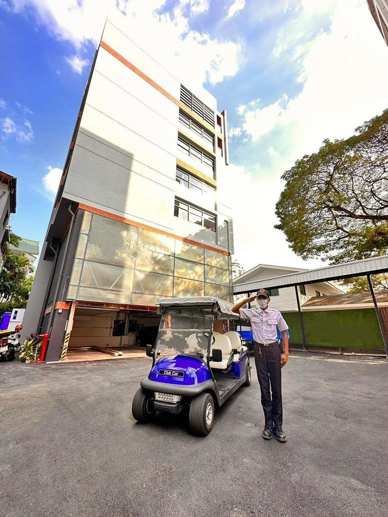 Exterior view of the multi-story modern building at 81 Sukhumvit Soi 2.