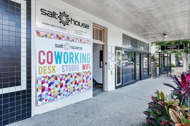 Street entrance at Level 1, 888 Brunswick Street with Salt Space coworking signage.