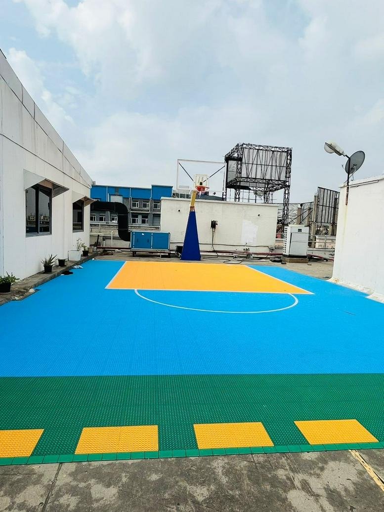 Colorful rooftop basketball court at A-68 Business Centre, Block-A, Sector-64.