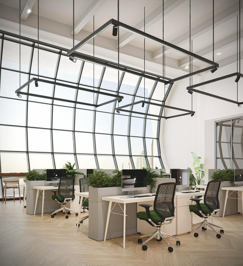 Spacious open-plan workspace at Al Barsha Road, Next to Mall of Emirates, Dubai with modern desks and large windows.