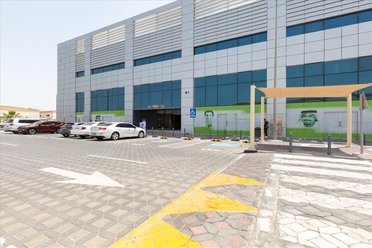 Modern exterior facade and entrance of the Cubes Park ICT, Mussafah, Abu Dhabi building.